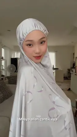 coba pake mukena ah