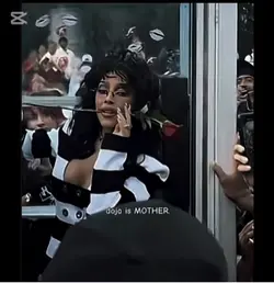 Doja Cat giving rose